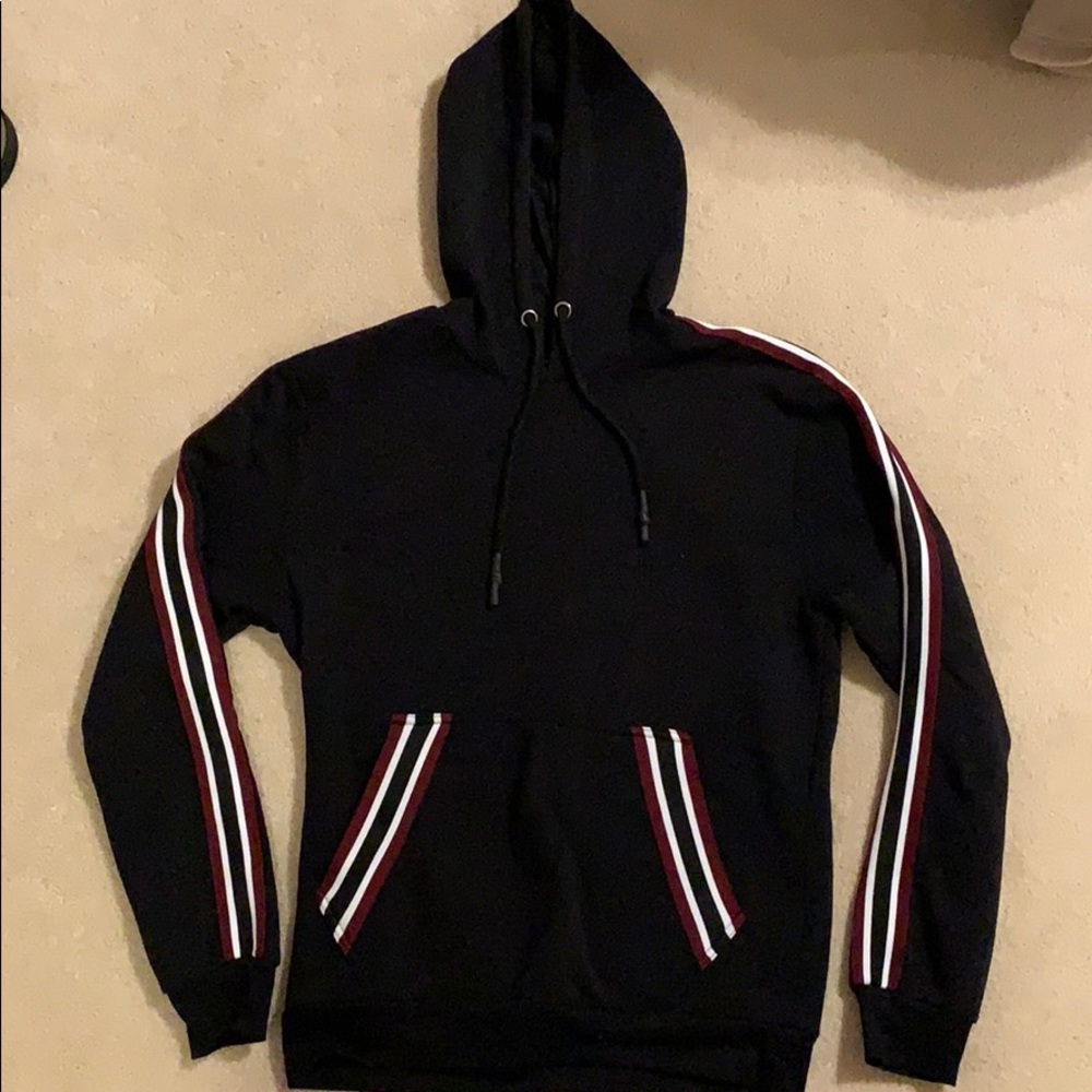 Black sweatshirt with red and white stripes